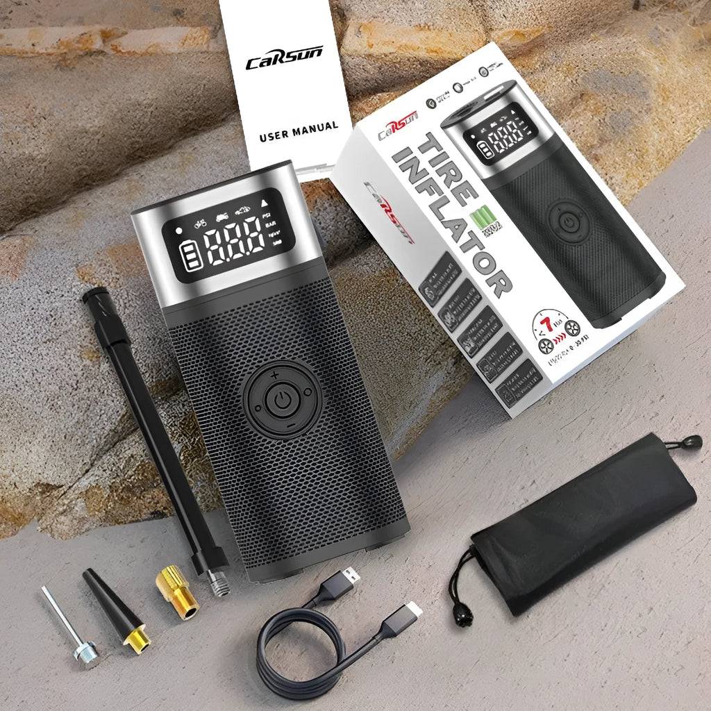 Black portable wireless smart air pump with LED light, USB cable, and nozzles for car, bike, ball, and swimming ring.
