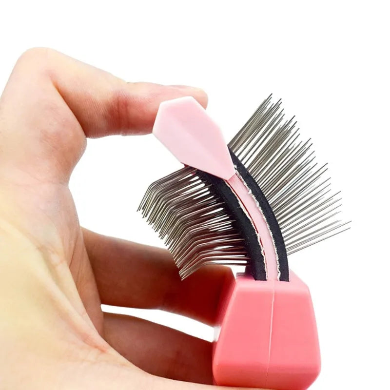 Double sided pet grooming brush with stainless steel pins on a blue handle