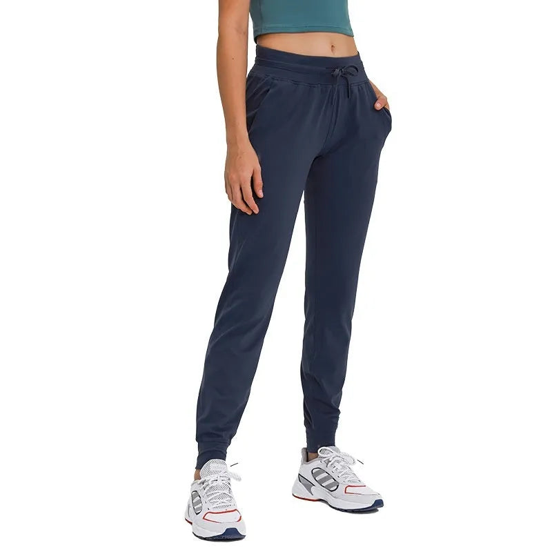 Women's high waist yoga pants in distilled coffee colour with drawstring waistband.