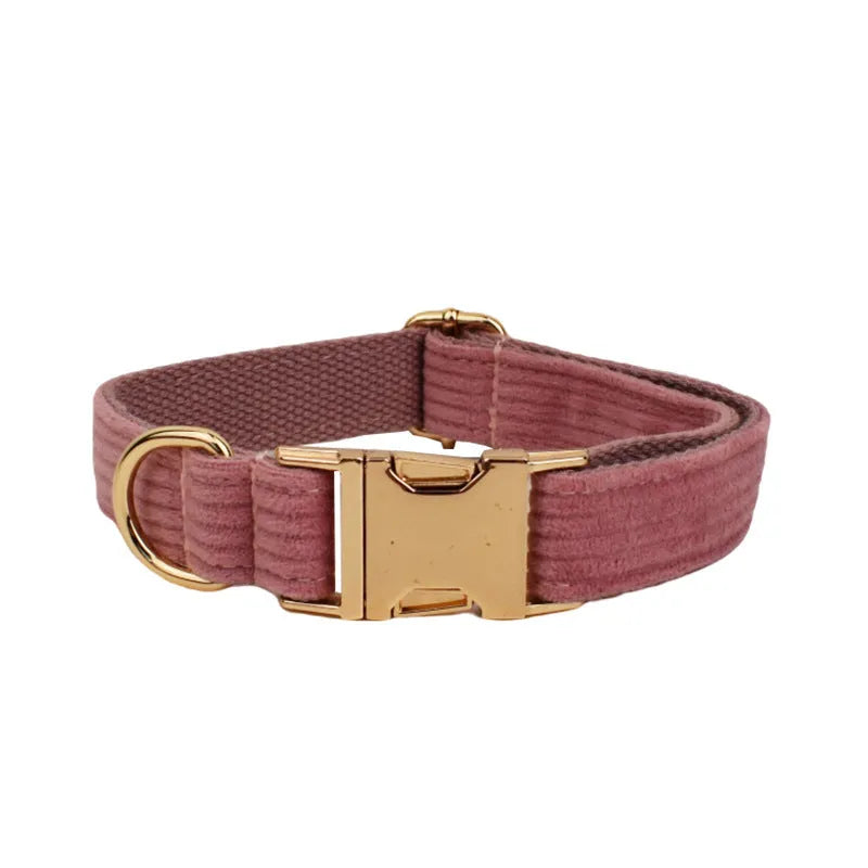 Corduroy dog collar and leash five-piece set with vest, bow, and poop bag in red.