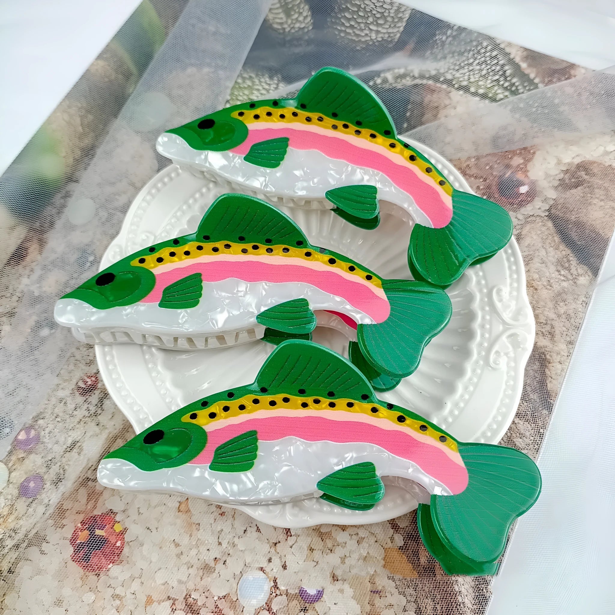 Dark green hair clip with detailed rainbow trout print on PVC material for marine enthusiasts