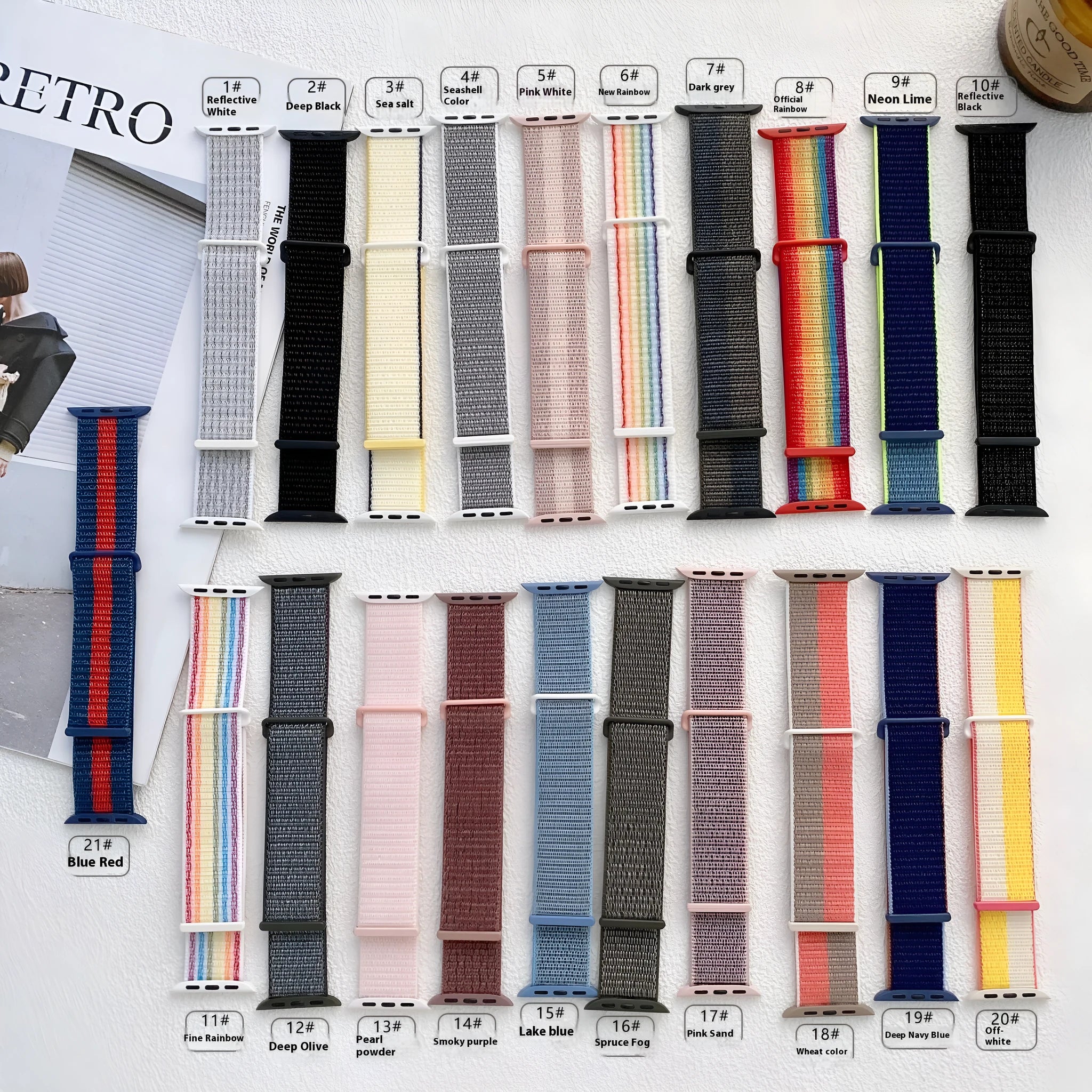 Woven nylon smartwatch strap in pink sand colour, shown detached from a watch.