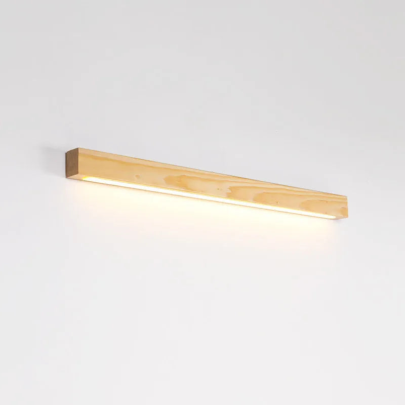 Walnut-coloured minimalist log strip wall lamp mounted on a wall.