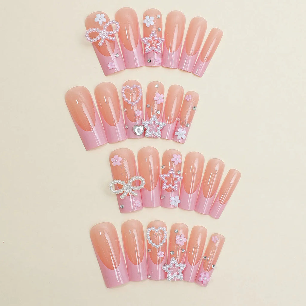 Super long artificial nails with French spot, bow detail, and love pattern in XB-70-48 colour.