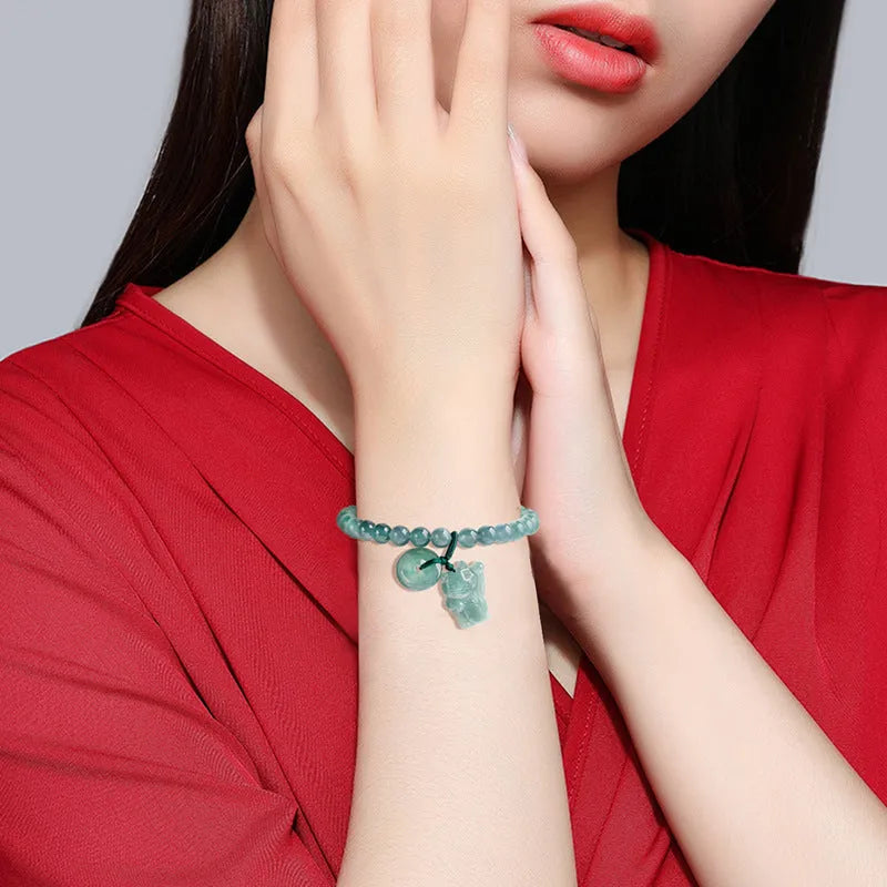 Emerald bead bracelet with blue lucky cat charm, hand woven for 14-16cm wrists
