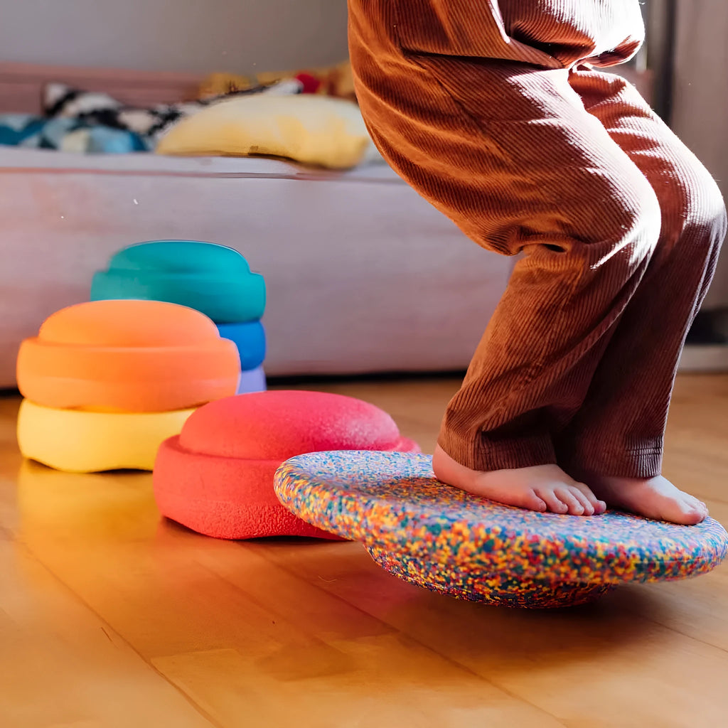 Plastic wood surf balance board for children in mixed colour or black finish.