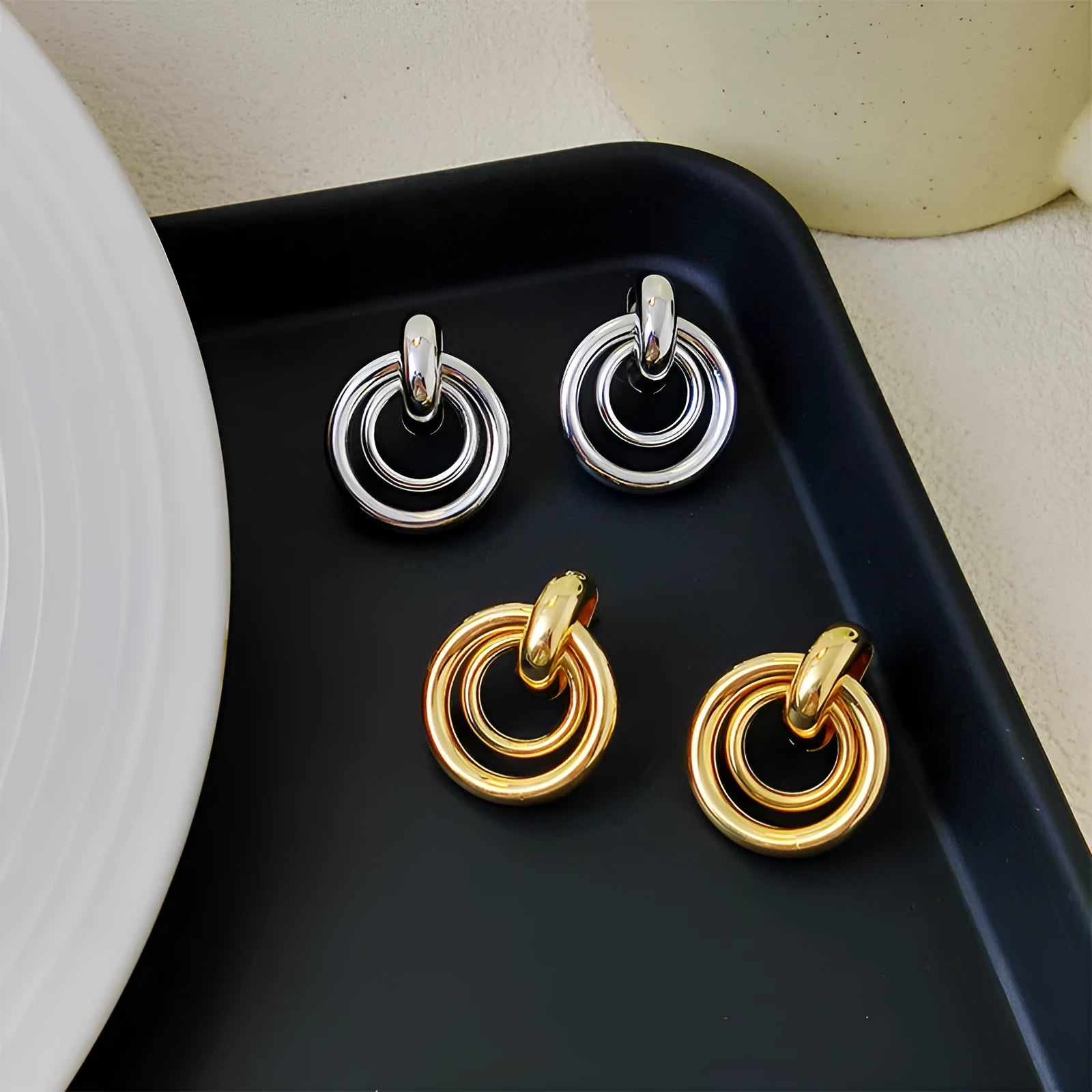 Women's geometric round ring earrings with irregular design in gold or silver electroplated finish