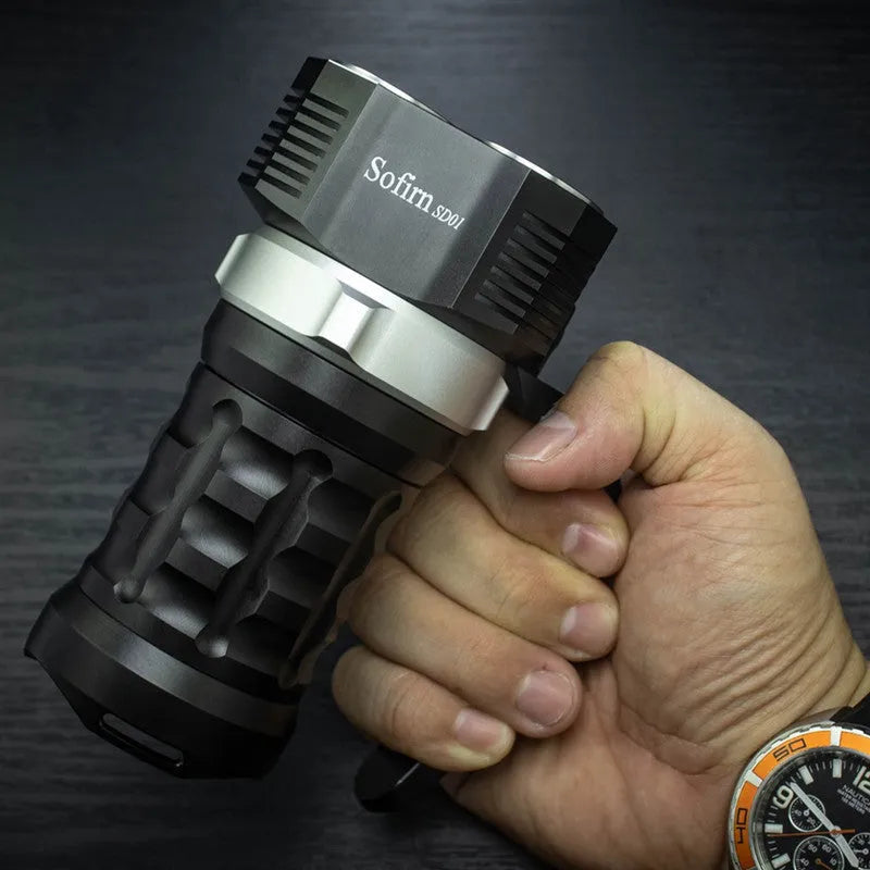 Aluminium alloy super bright diving flashlight with waterproof housing on dark background