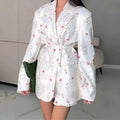 Women's collar lace-up waist-tight suit jacket in polyester, shown in apricot colour on a model.