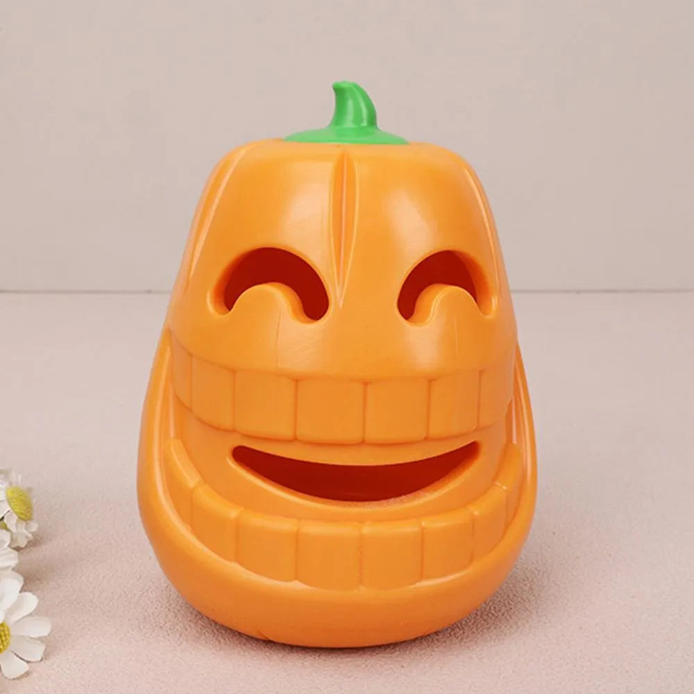 Yellow pumpkin-shaped TPR dog chew toy measuring 8.6x11.5cm for aggressive chewers