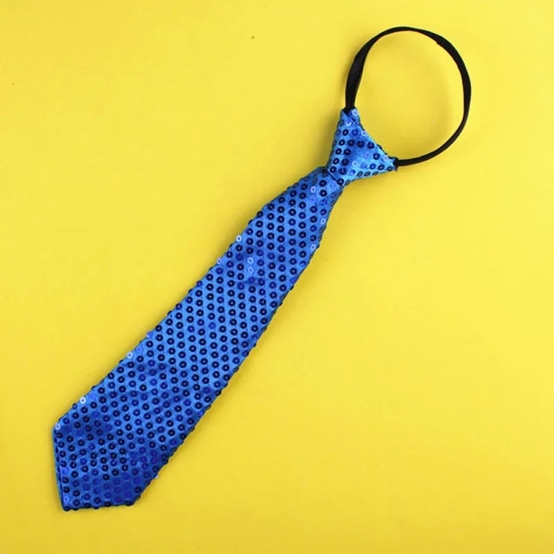 Gold sequin clip-on bow tie with striped pattern on white background.