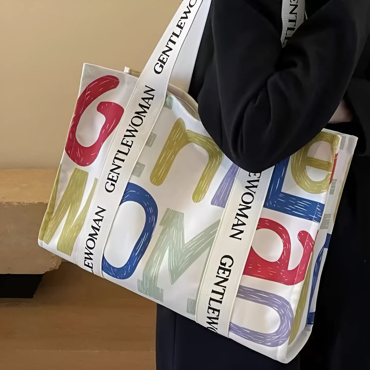 Large canvas women's tote bag with printed design options including letters and patterns
