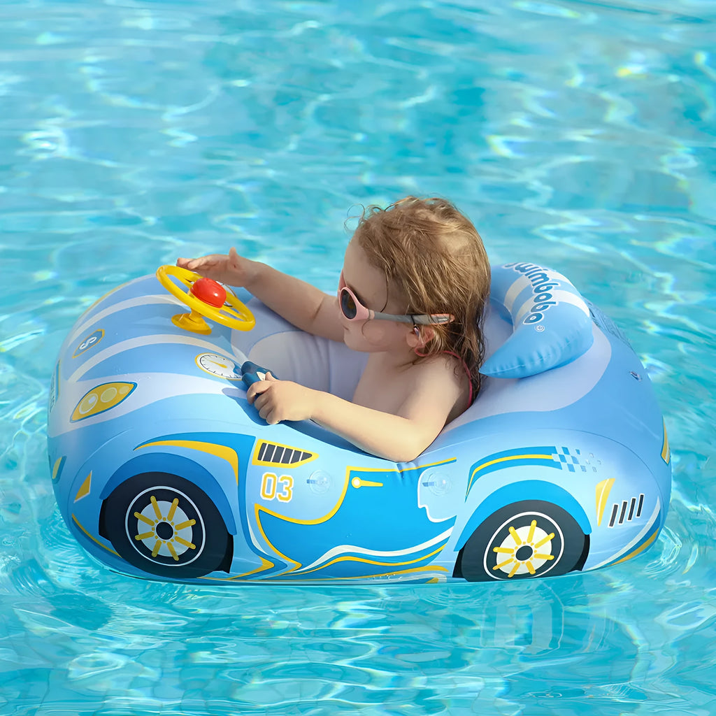 Pink inflatable children's swimming ring with a steering wheel and cartoon sports car boats pattern.