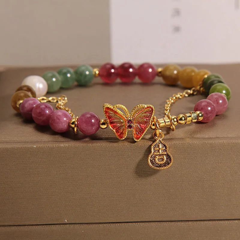 Natural jade coloured tourmaline bracelet with butterfly gourd pendant on adjustable agate bead band