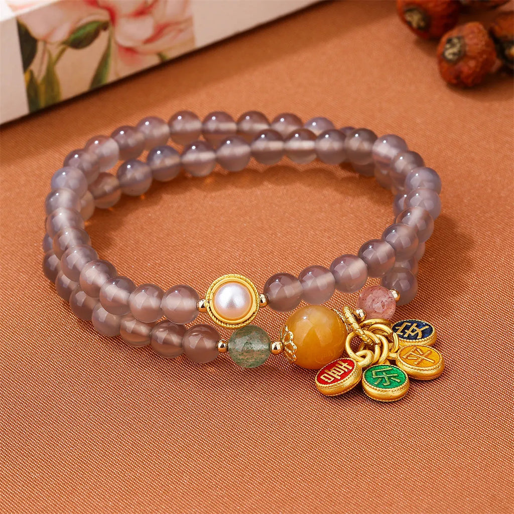 Natural grey agate bracelet with safe and happy motif, retro two-circle design on adjustable cord.