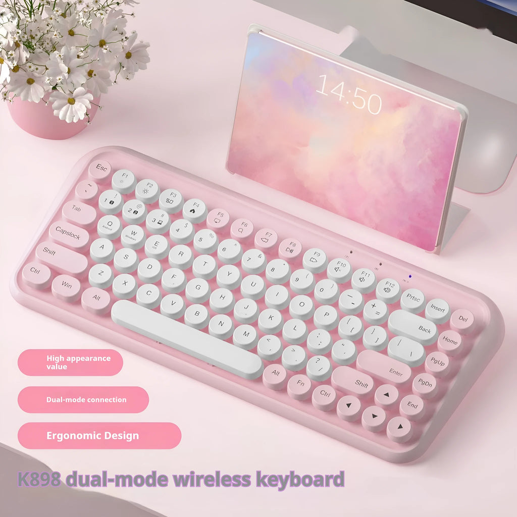 Pink Bluetooth keyboard with 84 quiet mechanical keys in compact wireless design