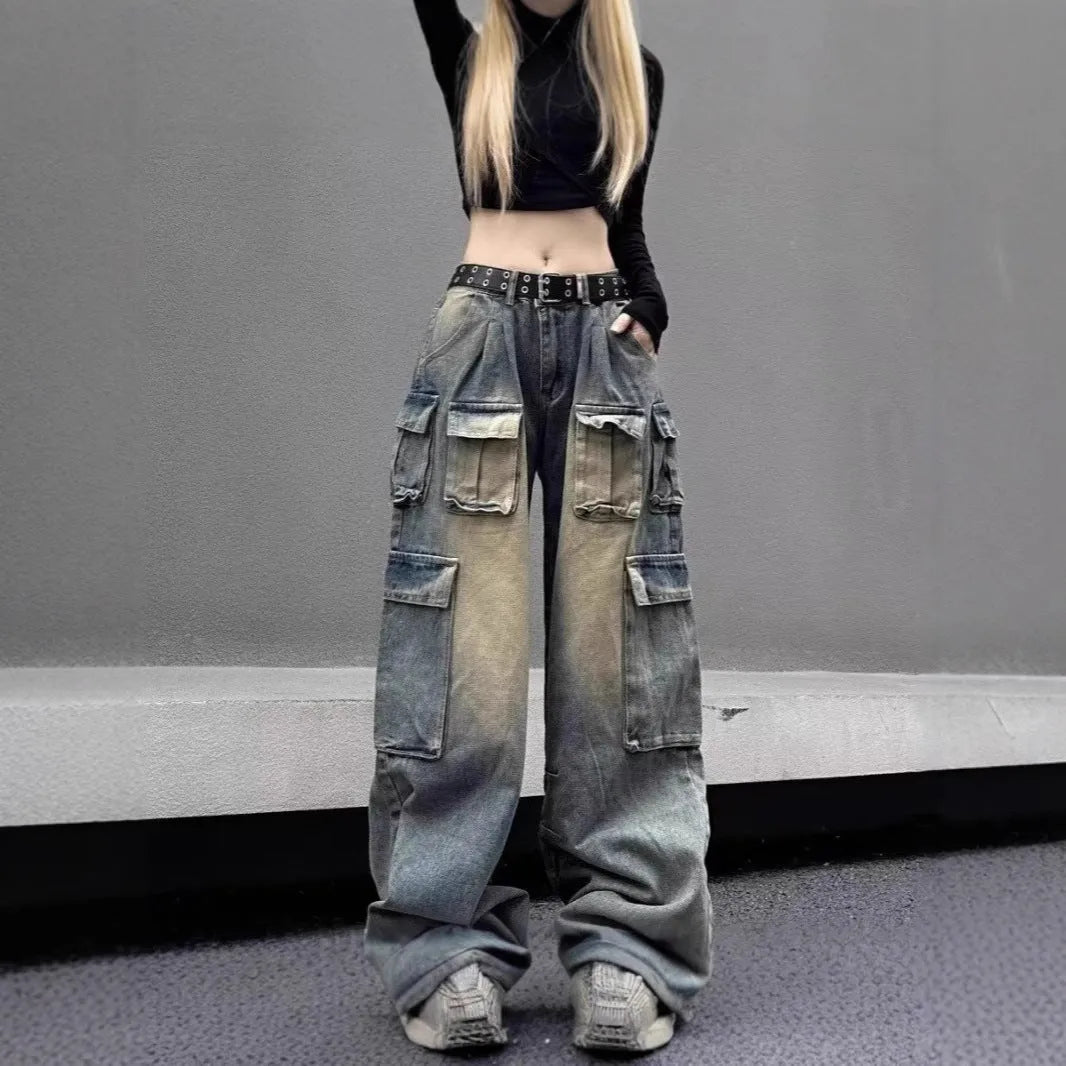 Men's light blue loose-fit distressed denim jeans with multiple pockets and straight-leg cut