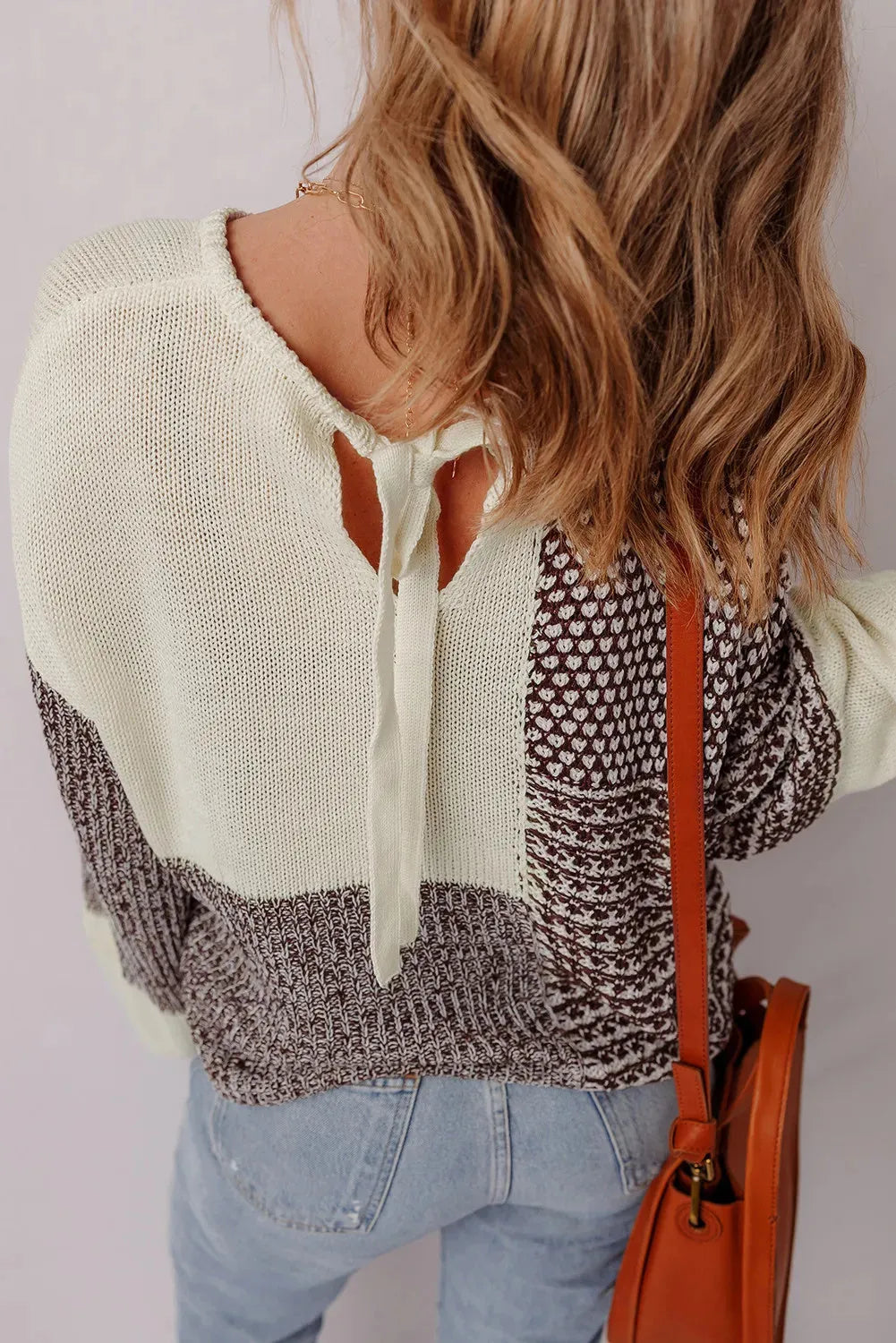 Dark Khaki women's loose sweater with colour block design and back tie detail.