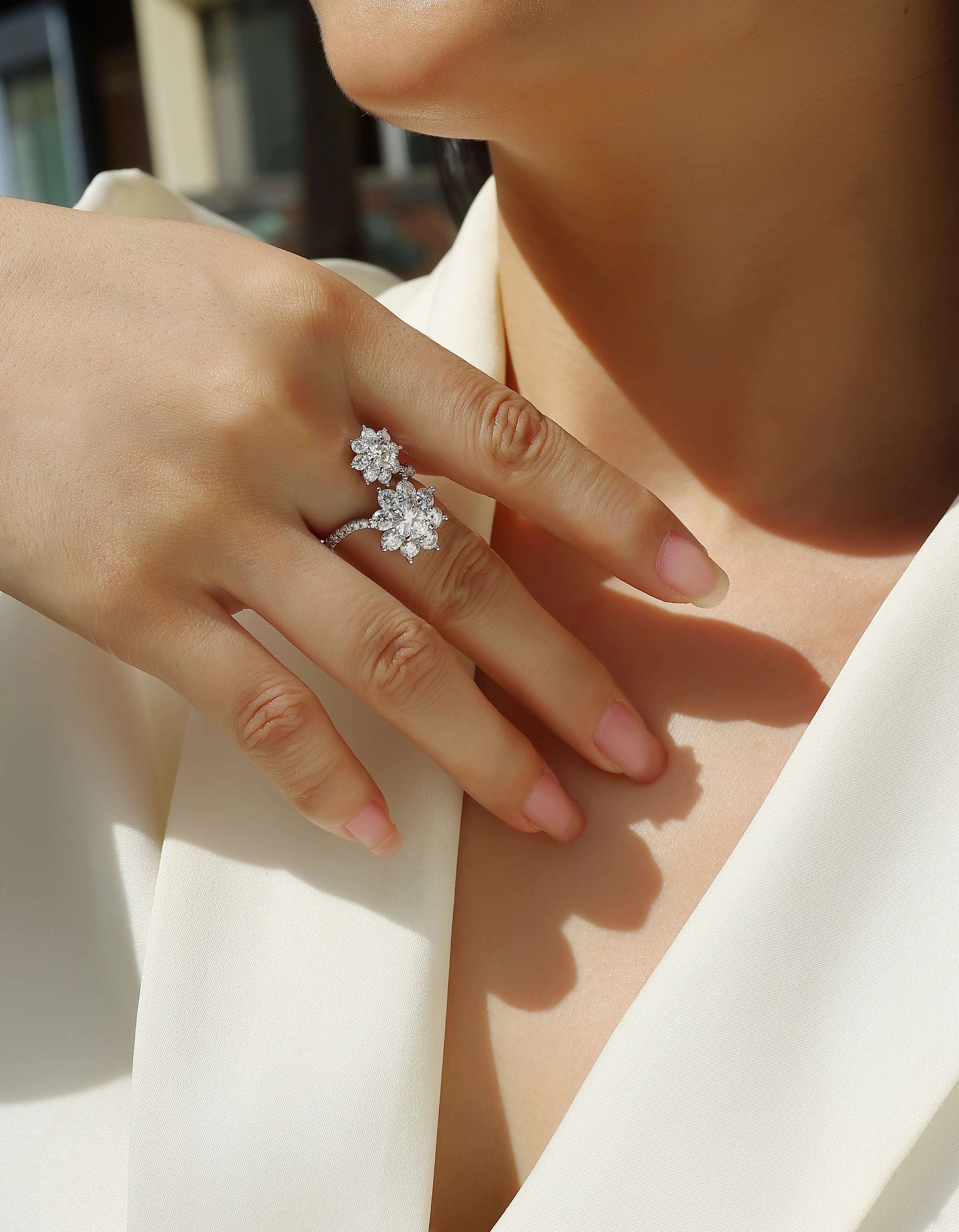 1 carat moissanite wedding ring set in S925 silver with platinum plating on a white background with gift box