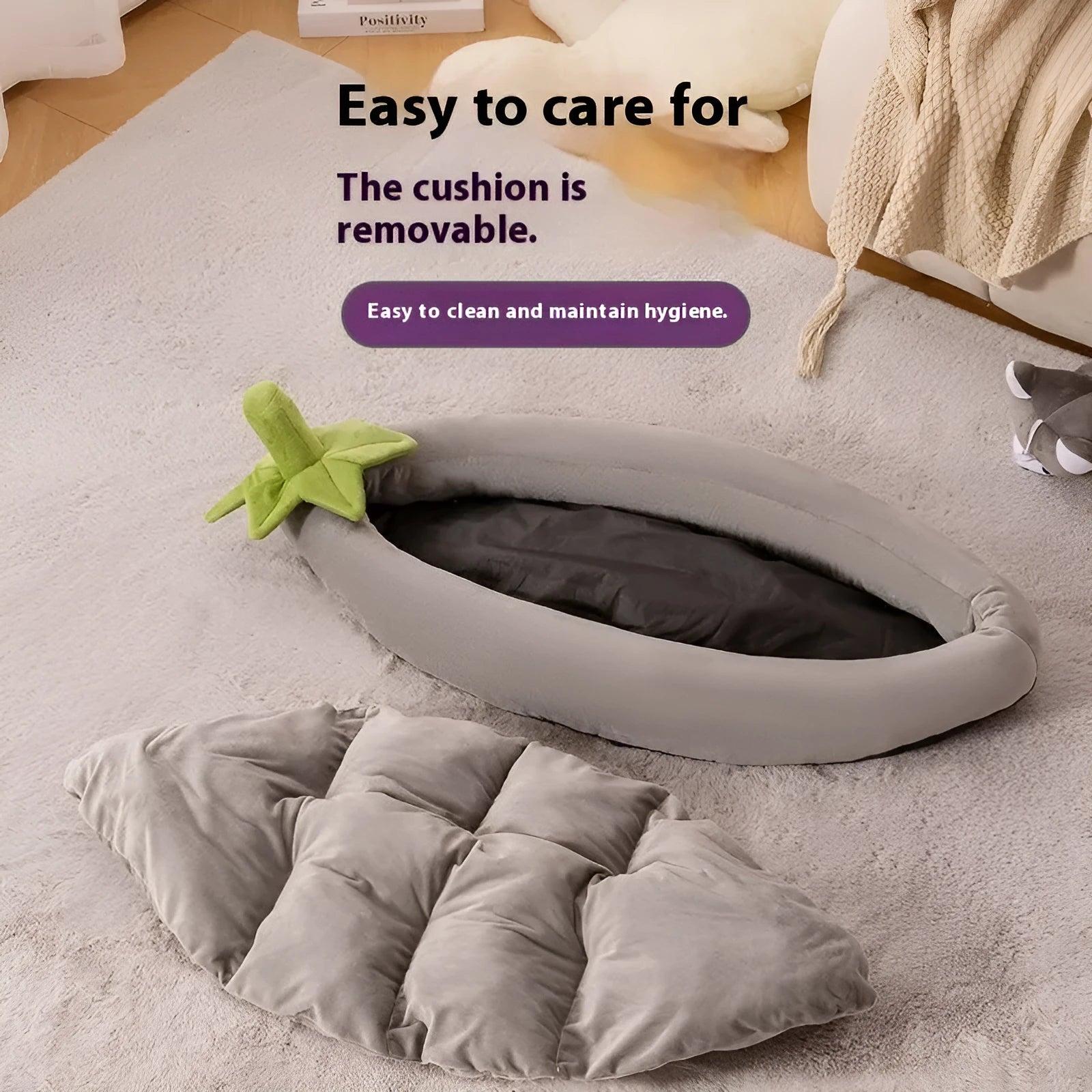 Rectangular washable dog mat with removable cover in purple, shown on a wooden floor.