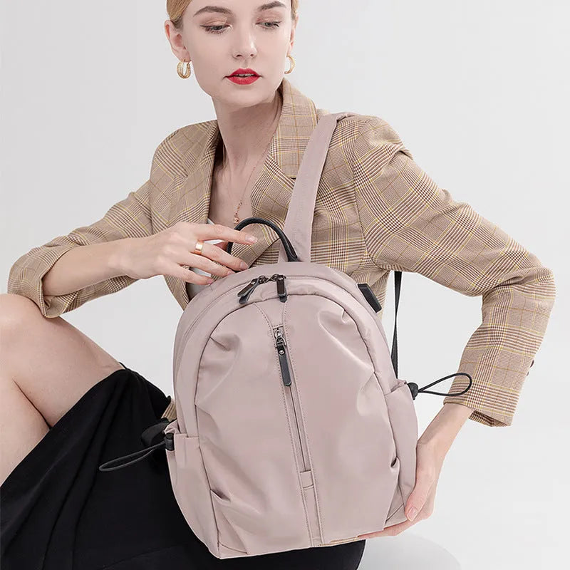 Women's Korean-style simple business travel backpack in dirty pink, Oxford cloth, with computer pocket, small A4 size