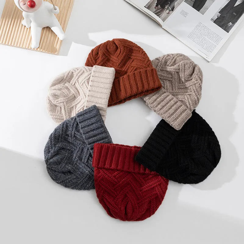 Wool knitted dome hat for women in ankela red with totem detailing.