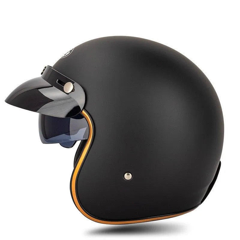 Retro half-shell riding helmet for electric bikes in classic colours on a grey background.