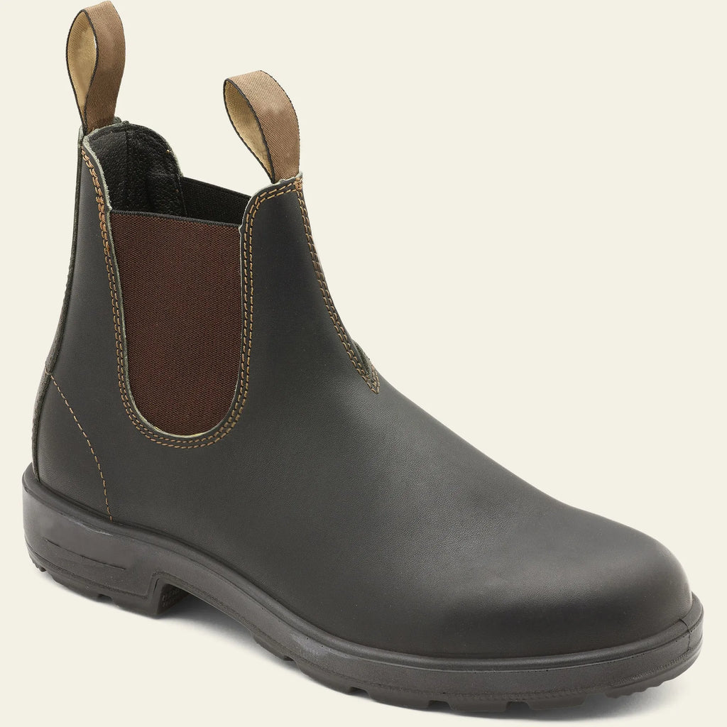 Vintage brown Chelsea boot with frosted PU upper, round toe, and mid-calf height on a wooden surface.