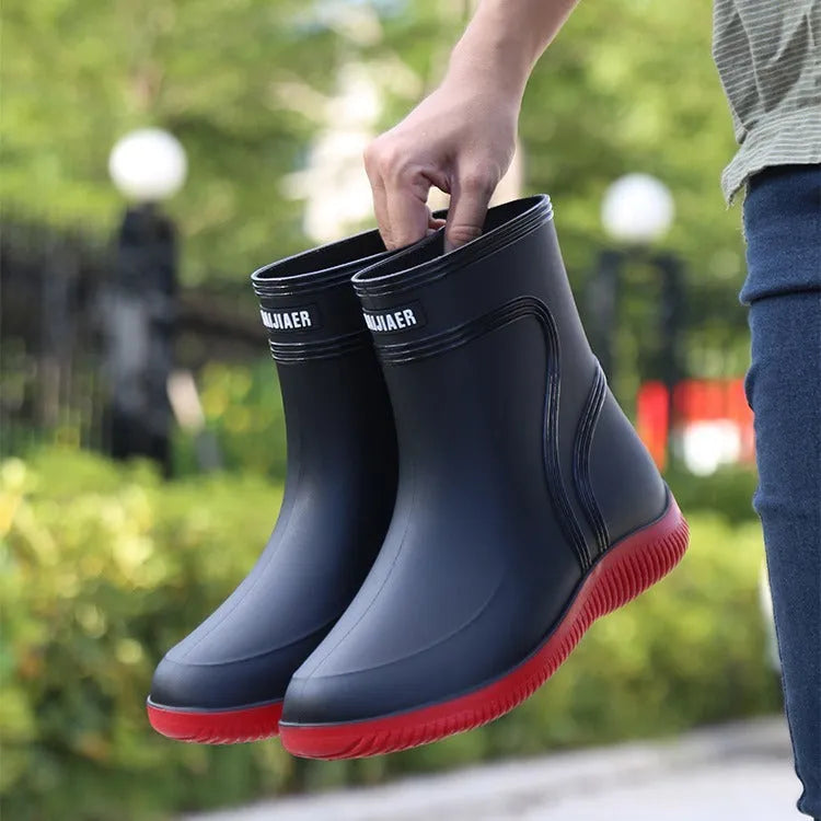 Men's waterproof mid-top rain boots with PVC upper and non-slip plastic sole in British style with tassel detail
