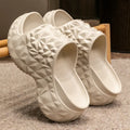 Women's khaki EVA high-heel wedge flip-flop slippers with a thick sole, shown from the side.