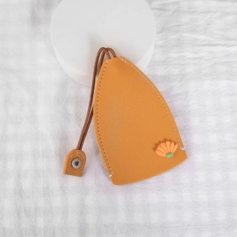Colourful cartoon PU leather pull-out key case for car keys, shown open and closed