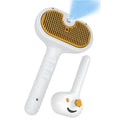 White pet steam grooming brush with gentle steel teeth and built-in water tank for dogs and cats