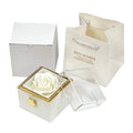 Rotating drawer jewellery gift box with red preserved rose under clear acrylic dome, showing open compartment.