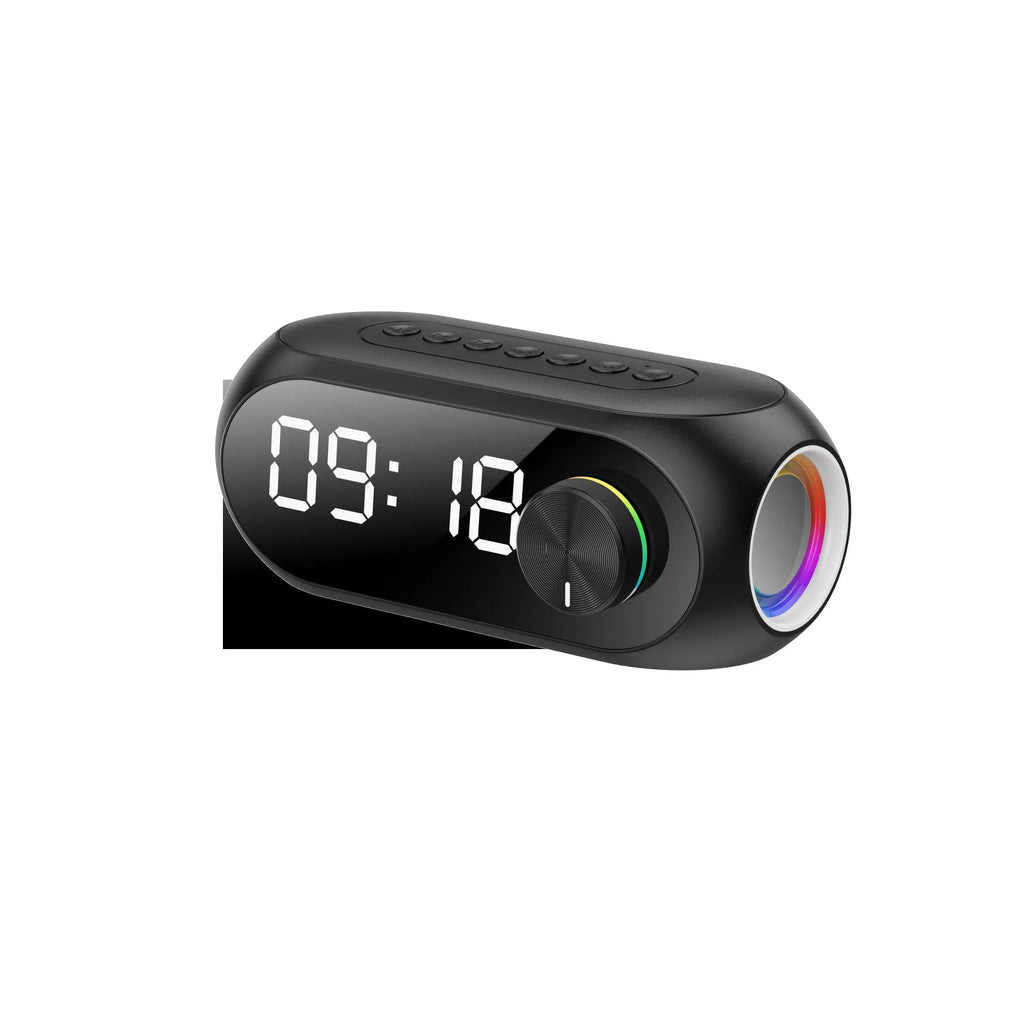 S8 Black Extra Bass portable mini USB speaker on a desk next to a laptop.