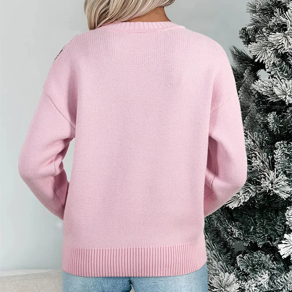 Women's spring round neck loose acrylic sweater in pink with long flight sleeves, shown on female model