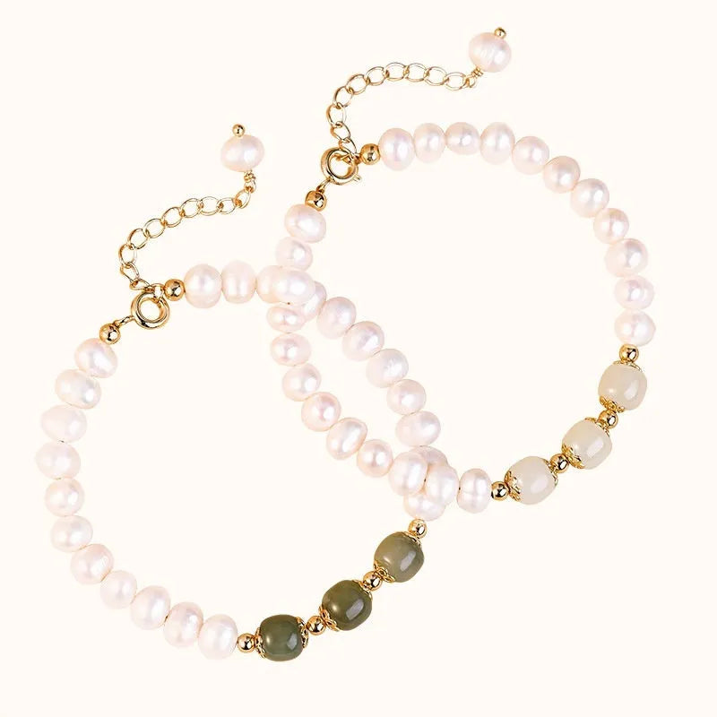 Natural freshwater pearl bracelet with a diamond-shaped electroplated pendant in Hetian jade colour.