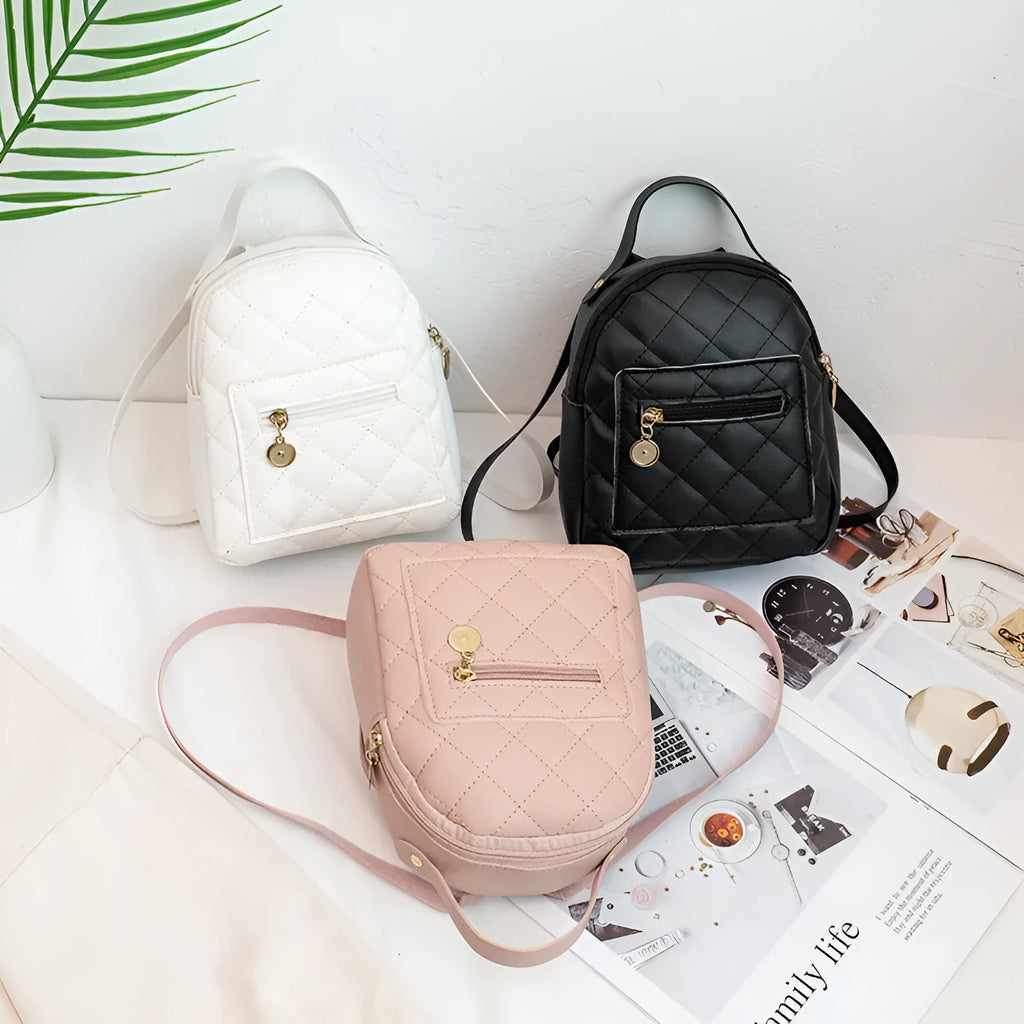 Girls' hard square embroidered backpack in white colour showing front design and soft handle.