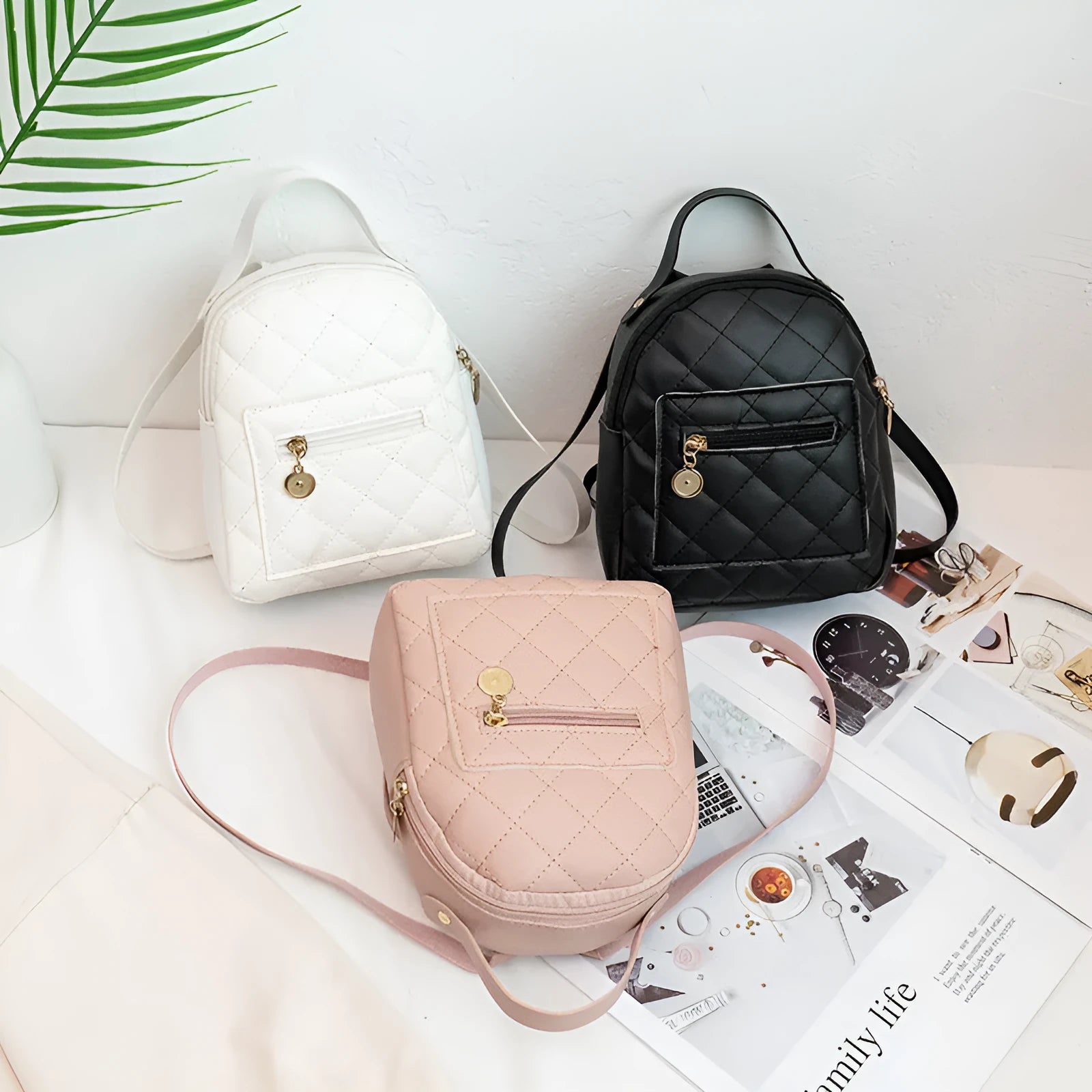 Girls' hard square embroidered backpack in white colour showing front design and soft handle.