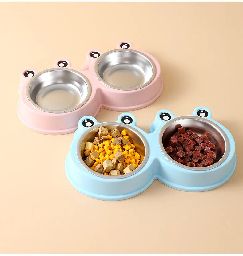 Stainless steel double compartment pet bowl for food and water on a silicone non-slip base.