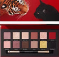 Explorer twelve-colour animal eye shadow palette showing eight themed designs in compact case