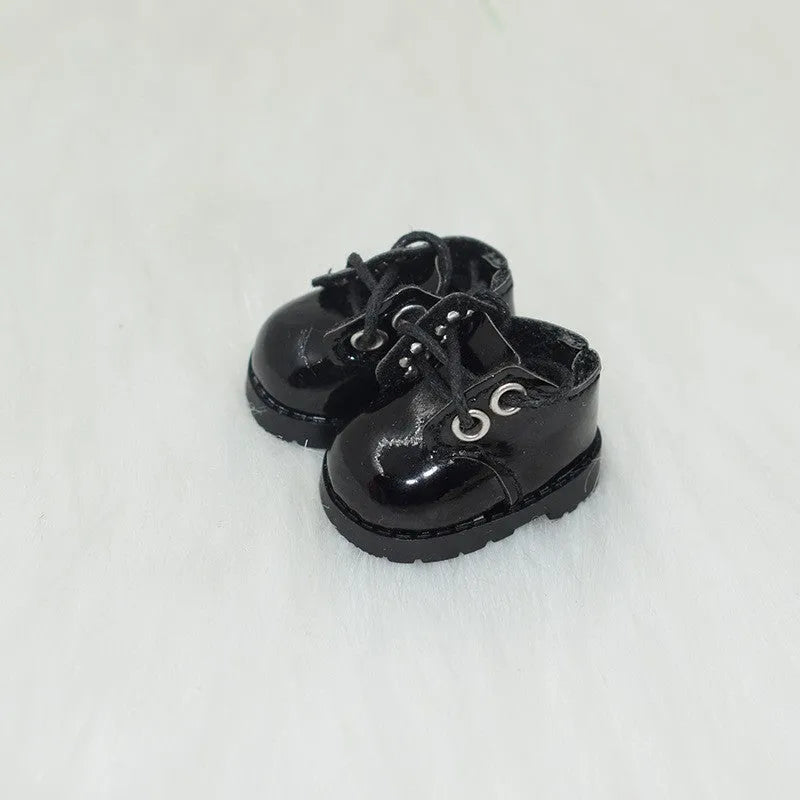 A pair of polyurethane doll shoe accessories for a 17cm figure, shown in a selected style and colour.