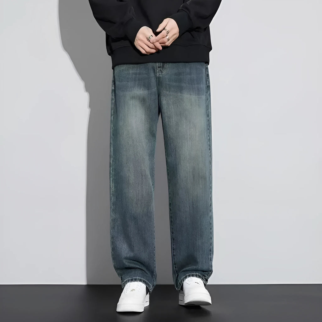 Retro straight-leg jeans for men in light blue cotton denim on a neutral background.