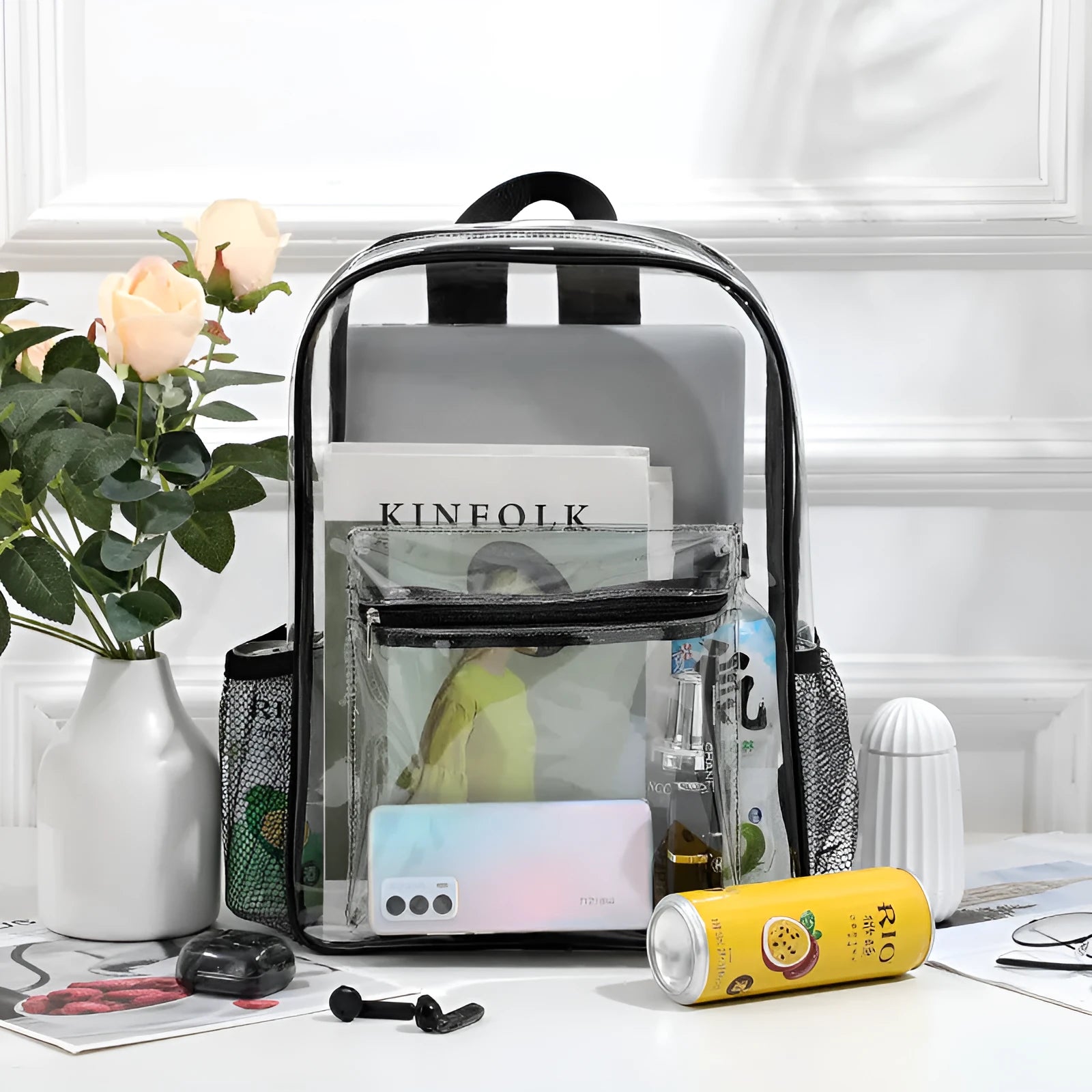 Large transparent PVC travel backpack in black, shown from the side, suitable for airport security and events.