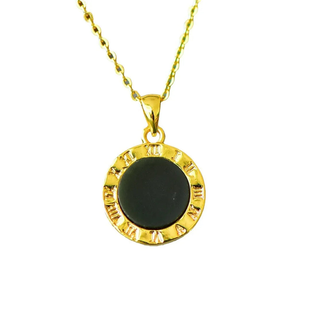 Gray Hetian jade flat pendant with copper inlay on an ink blue cord necklace.