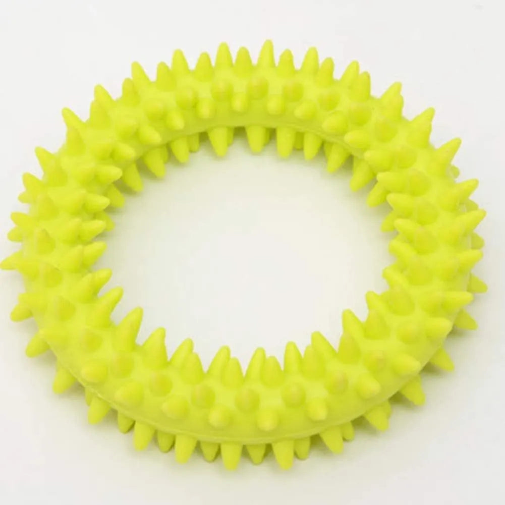 Blue TPR spiky circle ring dog chew toy for teeth cleaning on a white background.