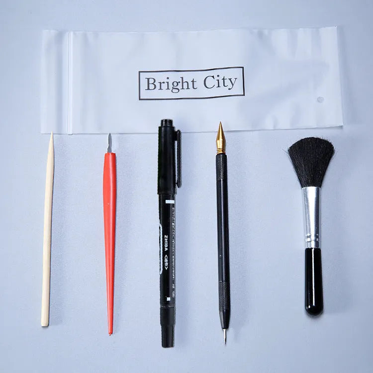 Scraping painting tools set showing 14.5cm long implements with white card paper compatibility