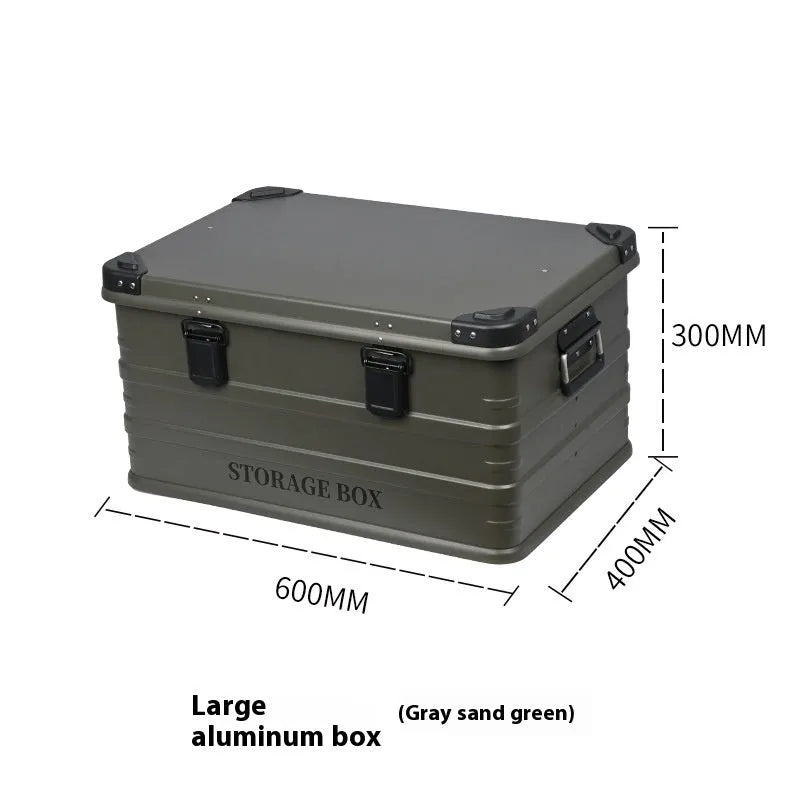 Army green waterproof plastic storage box sitting in a car boot