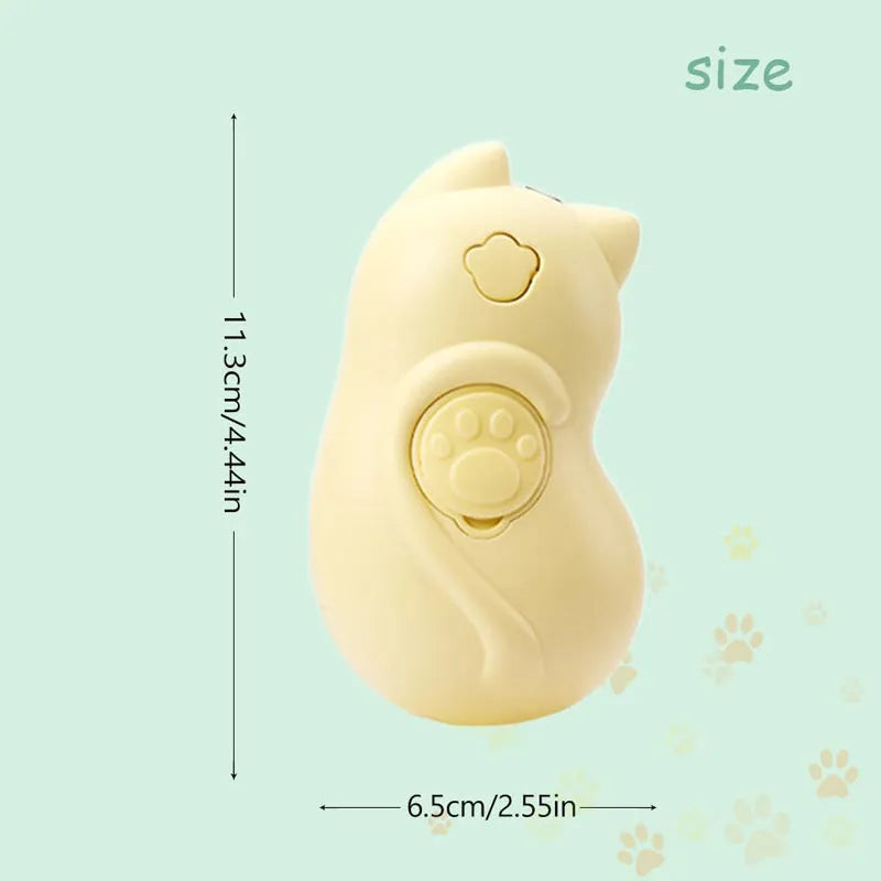 Compact white 3-in-1 steam grooming brush for removing tangled hair from cats and dogs on a table.