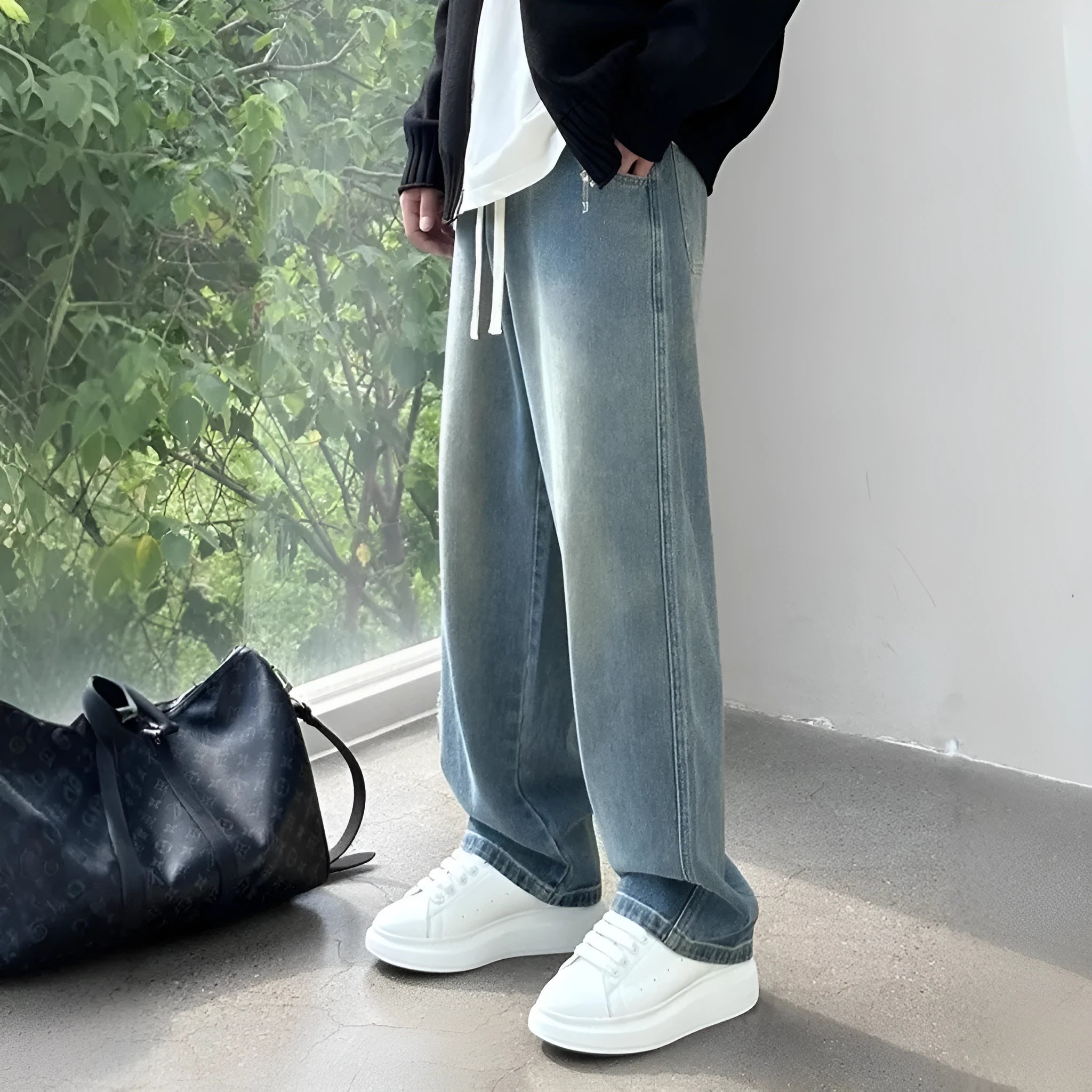 Men's straight-leg cotton denim trousers in blue with drawstring waist and loose fit
