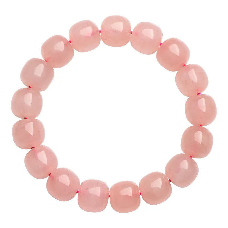 Pink crystal barrel bead bracelet with 8x10mm geometry-shaped stones on wrist